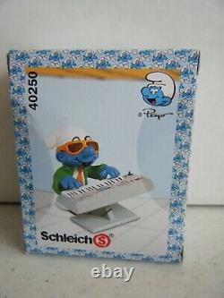 Drummer Smurf #40623 Guitar Smurf #20449 Keyboard #40250 & Trumpet Smurf #20539