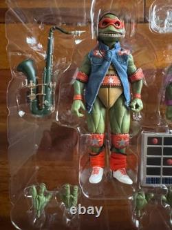 NECA SDCC Teenage Mutant Ninja Turtles Musical Mutagen Tour 4 Pack & Bonus Sz L