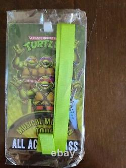 NECA TMNT Musical Mutagen Tour 2020 Con Exclusive (T-Shirt L Badge & Bag)