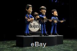 The Beatles McFarlane 2004 Cartoon Figure Set c/w Guitars, Drums & 4 Piece Stage